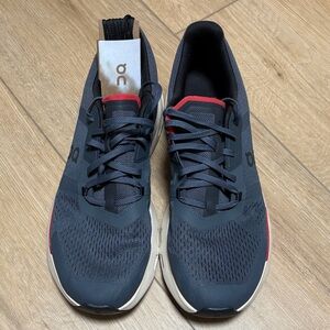 On Running Dark Blue and Red Athletic Shoes